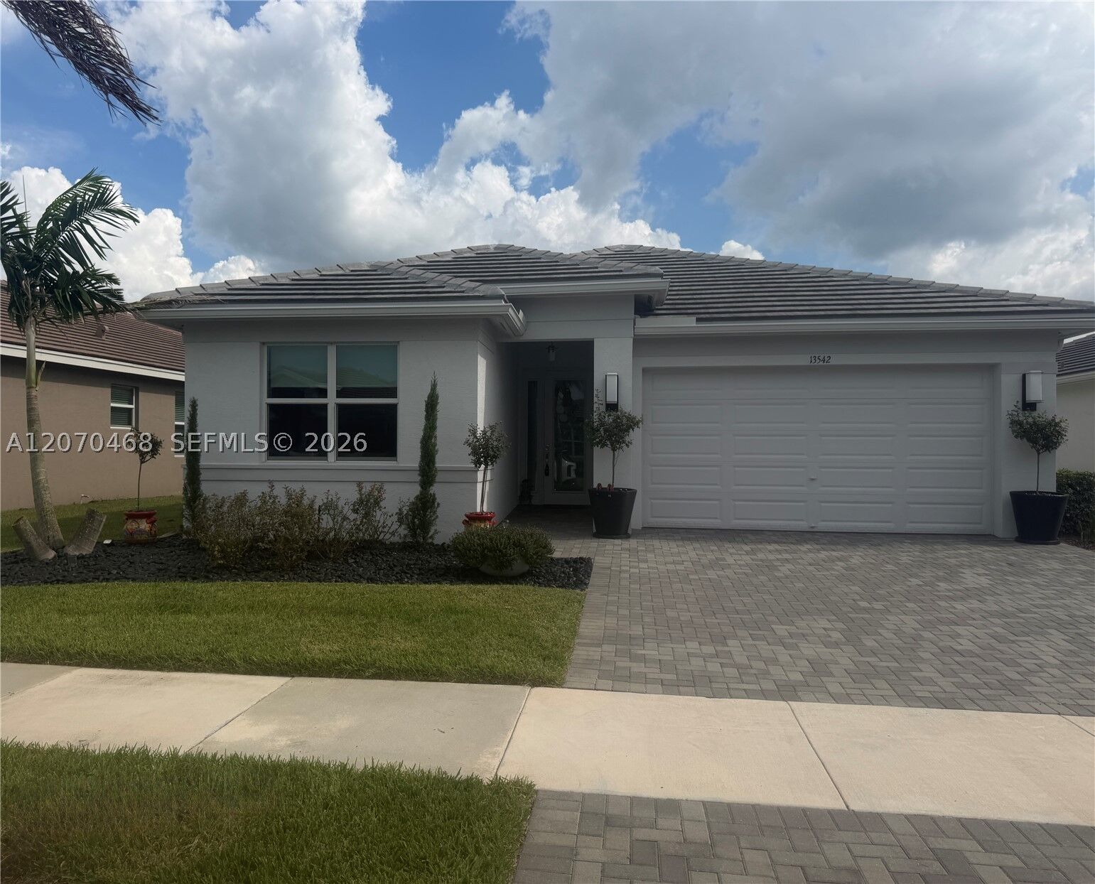 Property Photo: 13542 SW Oceanus Blvd FL 34987