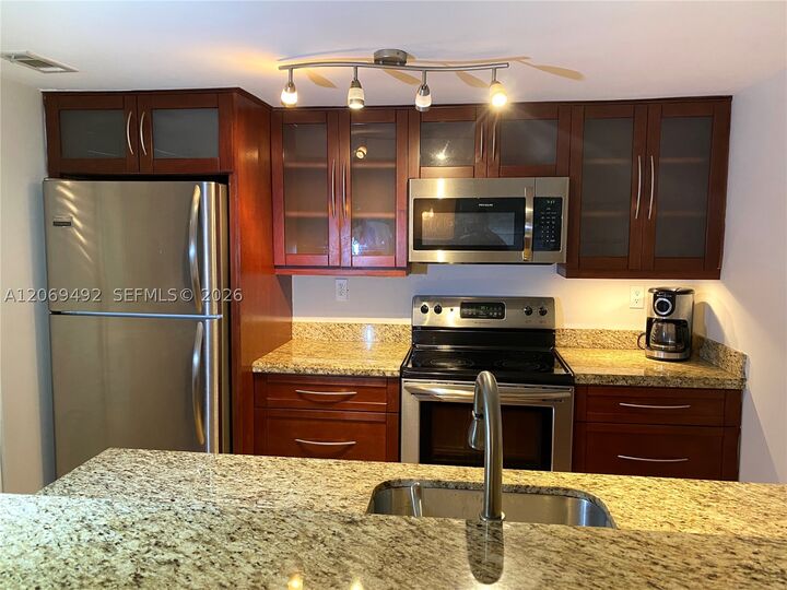 Property Photo:  4530 SW 68th Ct Cir 32-6  FL 33155 