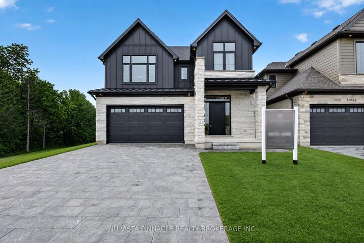6875 Heathwoods Avenue — photo 1