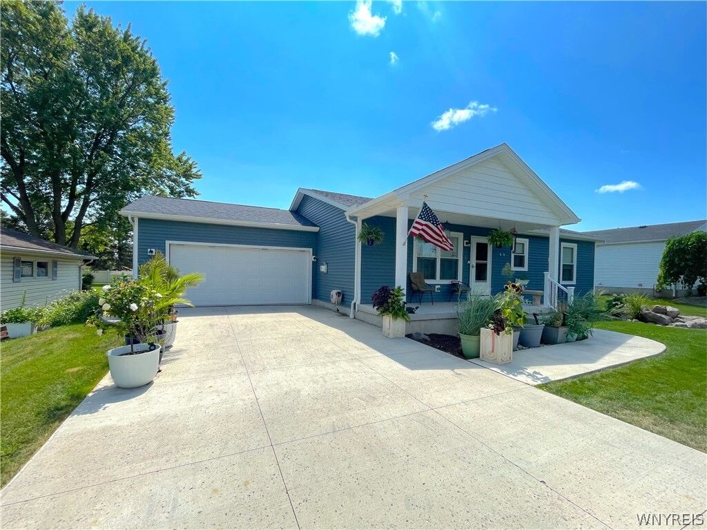 Property Photo: 8295 E Britton Drive NY 14304
