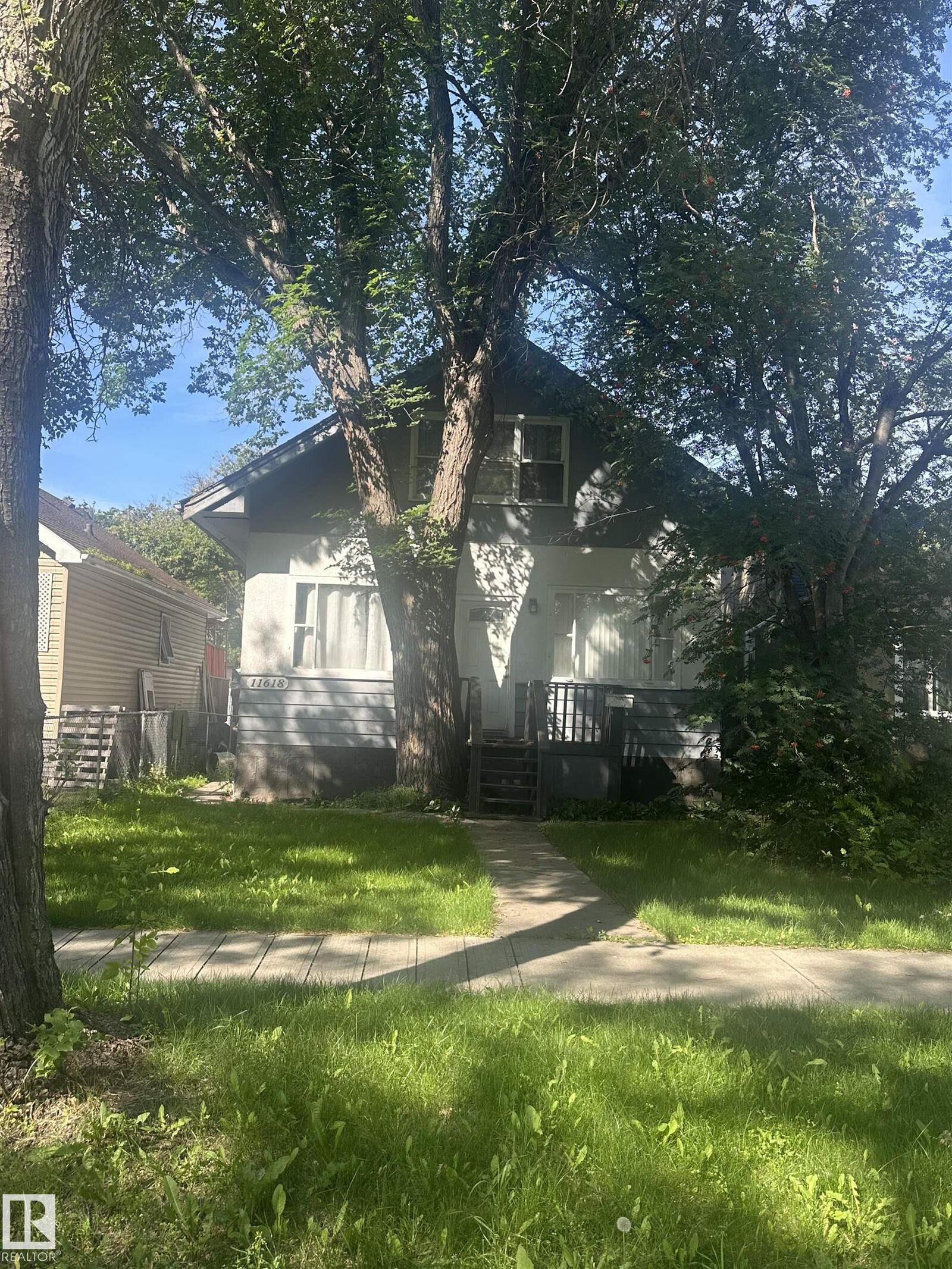 Property Photo: 11618 89 Street NW AB T5B 3V2