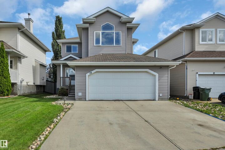 Property Photo: 24 Birchmont Drive AB T9E 8S3