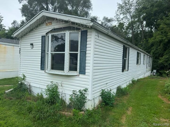 Property Photo: 926 Hill St Lot #35 MI 48875