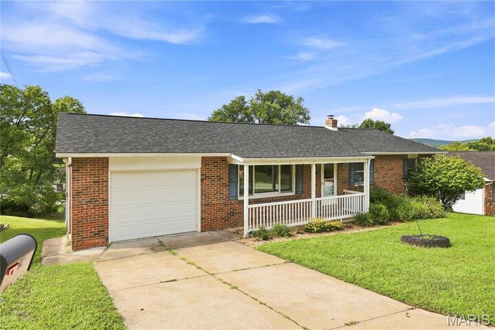 Property Photo:  210 E 12th Street  MO 65041 