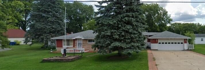 Property Photo:  1820 SE Boutell Road  MI 48732 