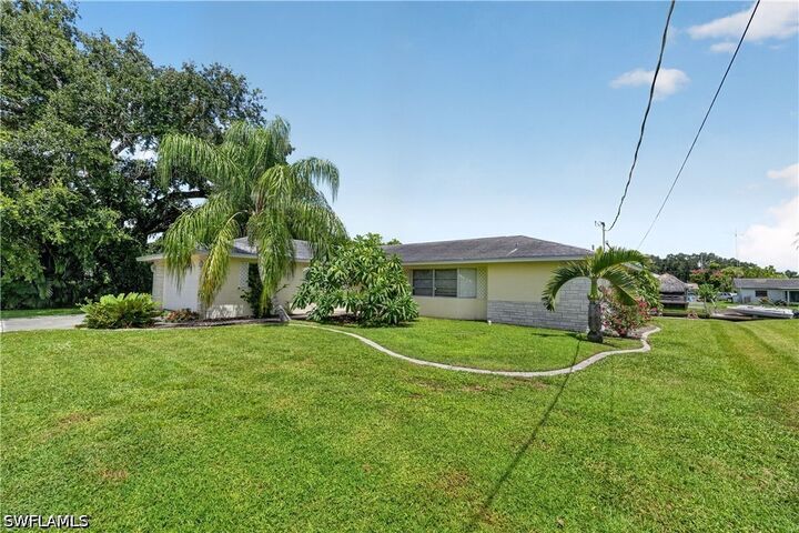 Property Photo:  13512 Caribbean Boulevard  FL 33905 