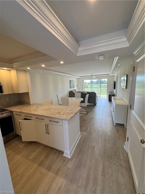 Property Photo:  37 High Point Cir E 305  FL 34103 