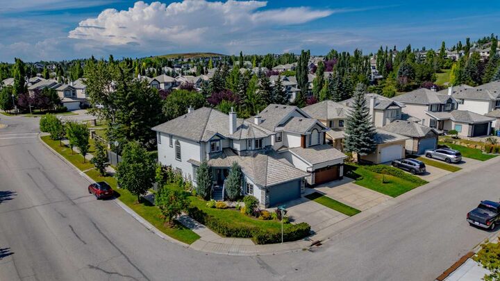 Property Photo: 142 Springbank Crescent SW AB T3H 3S6