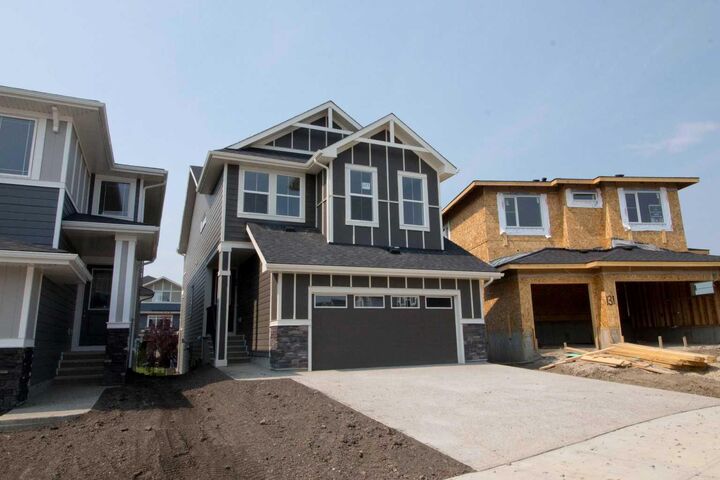 Property Photo:  127 Sundown Crescent  AB T4C 1Y3 