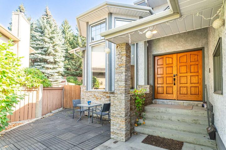 Property Photo: 307 Woodhaven Bay SW AB T2W 5S2