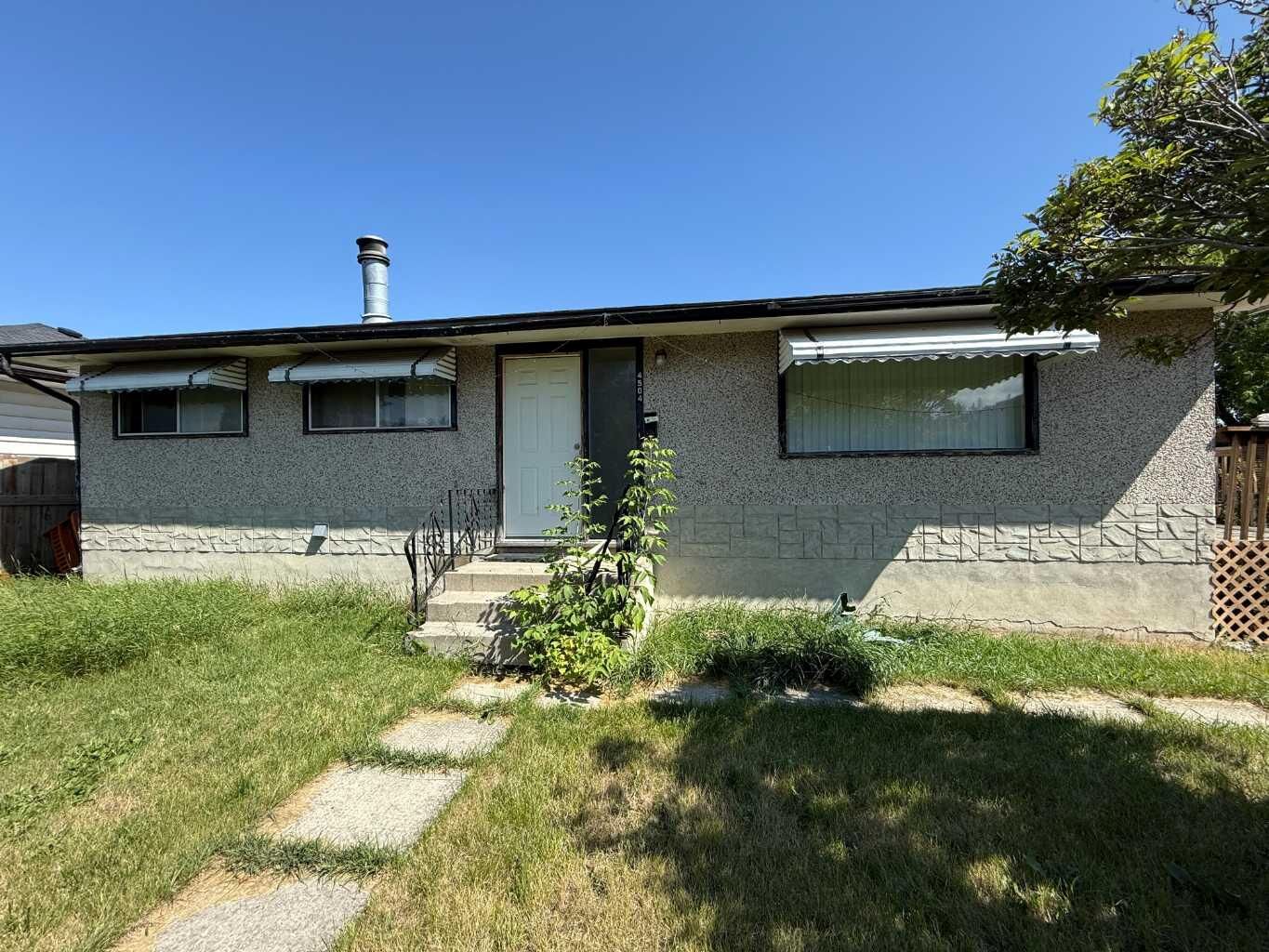 Property Photo: 4504 Greenview Drive NE AB T2E 5R6
