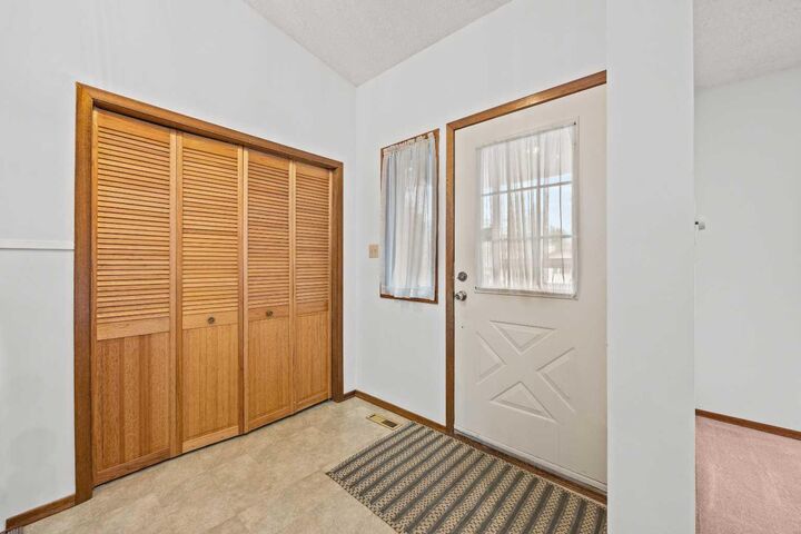 Property Photo: 147 Whitlock Close NE AB T1Y 4X2