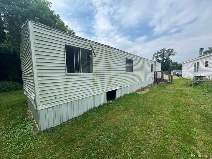 Property Photo: 926 Hill St Lot #18 MI 48875
