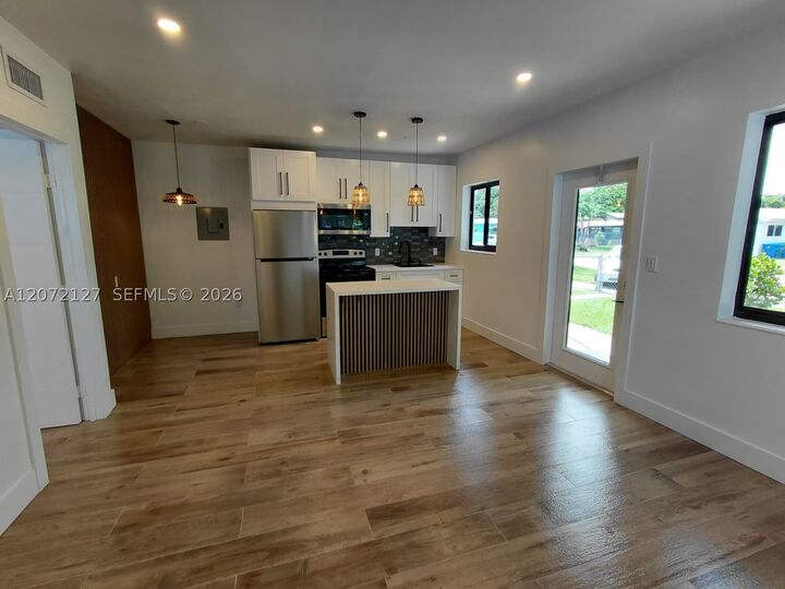 Property Photo: 1430 NW 45th St 1 FL 33142