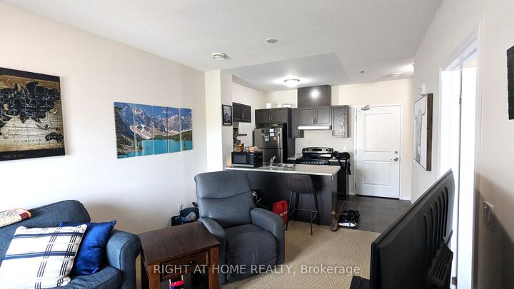 Property Photo: 1360 Costigan Road 210 ON L9T 0Y8