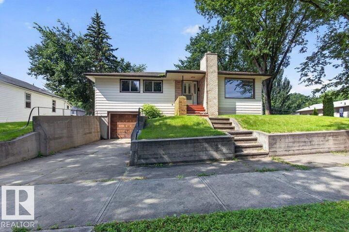 Property Photo:  11852 55 Street NW  AB T5W 3P8 