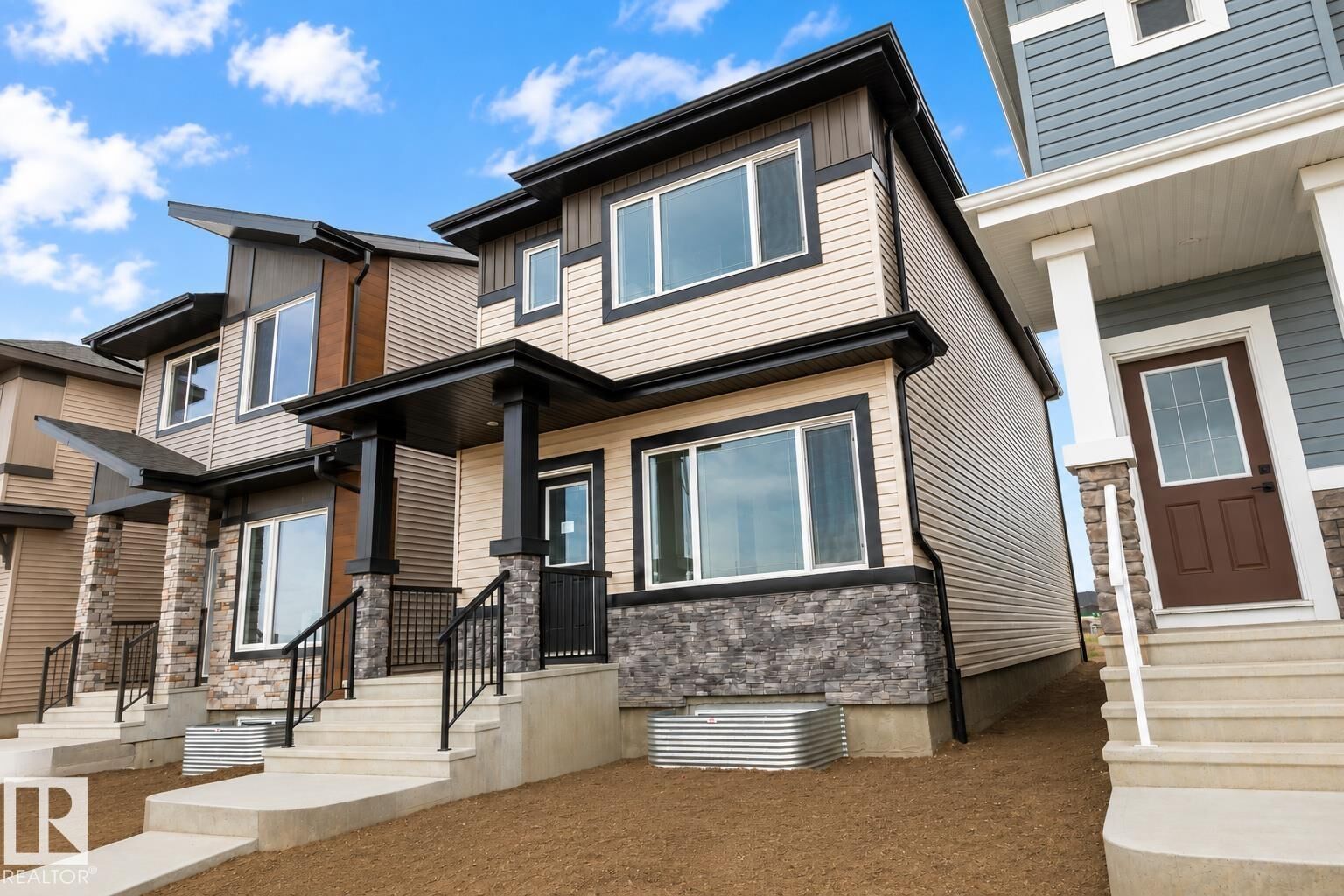 Property Photo:  219 157 Avenue NE  AB T5Y 4M1 