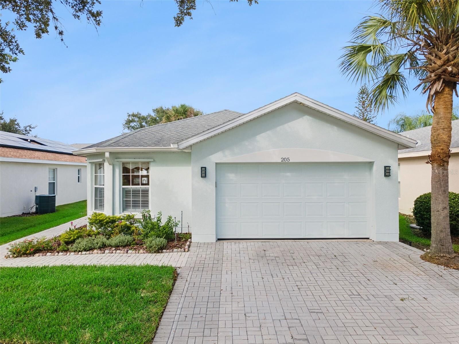 Property Photo:  205 Bell Tower Crossing West  FL 34759 