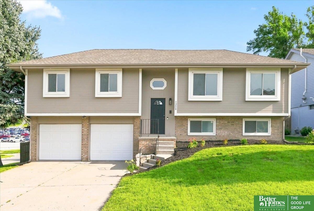 Property Photo:  1208 Sunshine Boulevard  NE 68123 