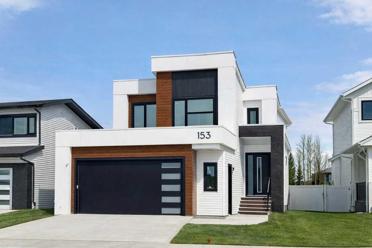 Property Photo: 153 Emerald Drive AB T4P 3G6