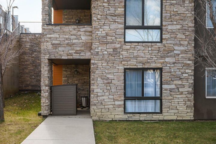 Property Photo: 10 Kincora Glen Park NW 115 AB T3R 1R9