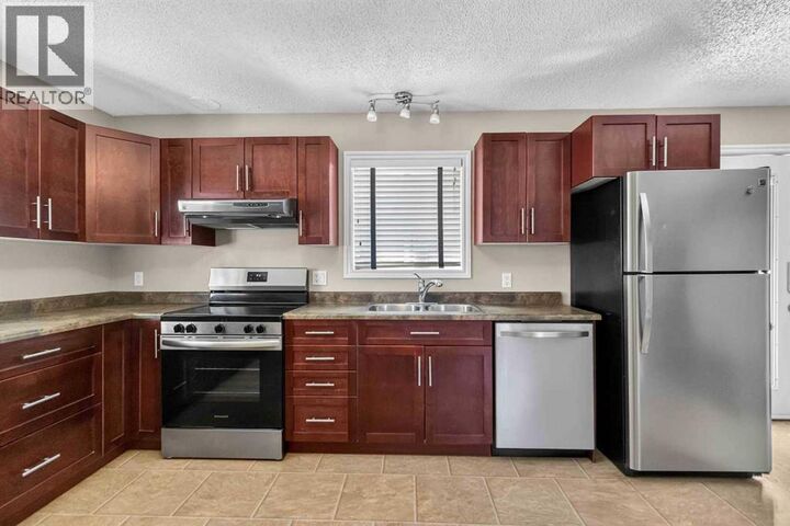 Property Photo: 177 Leigh Crescent AB T9K 1K2