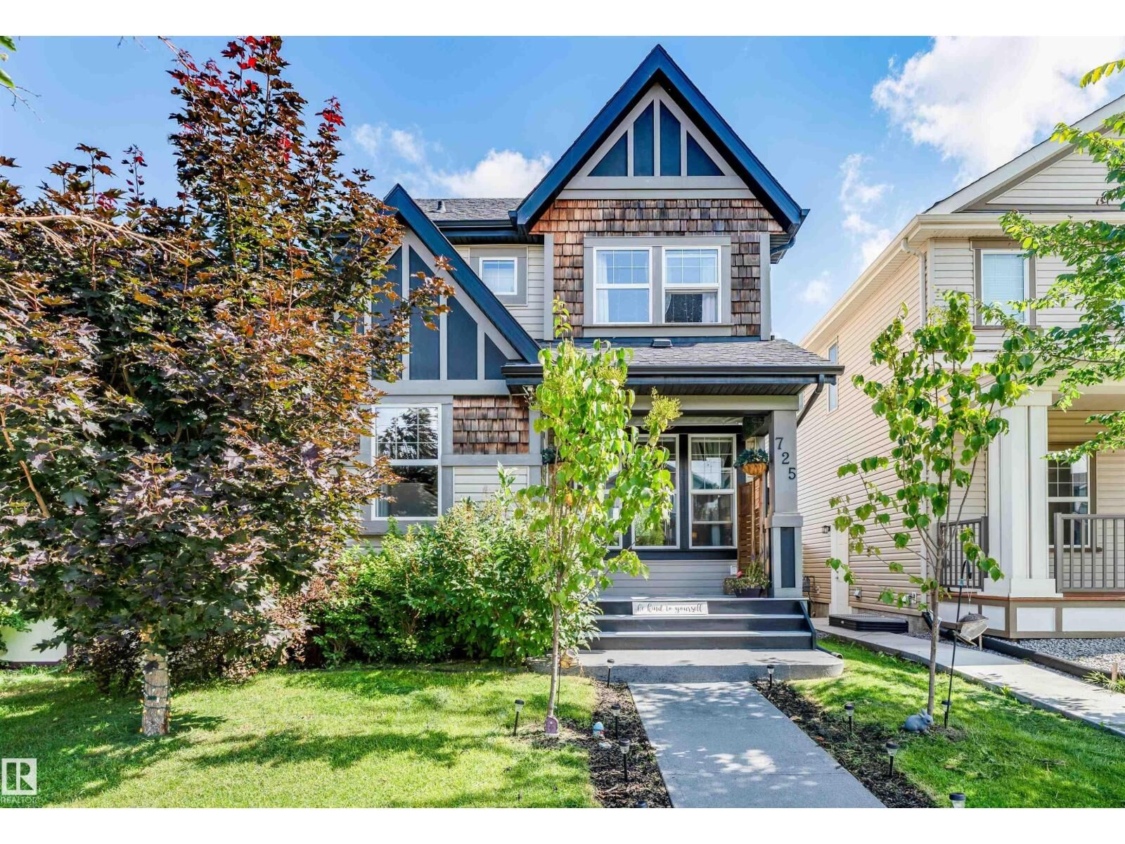 Property Photo:  725 Secord Bv NW  AB T5T 7A8 