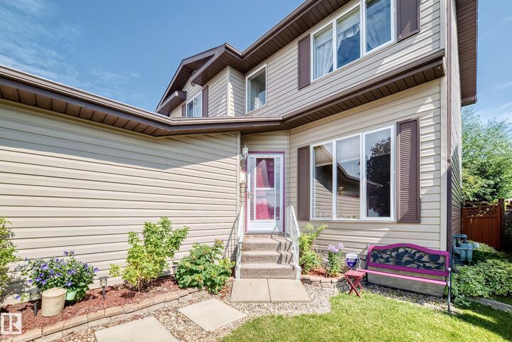 Property Photo:  13069 37 Street NW  AB T5A 5A4 