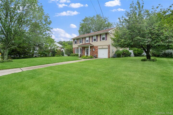 Property Photo:  28 Block Boulevard  NY 11776 
