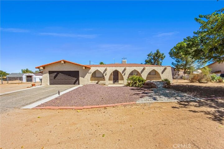 Property Photo:  9419 Guava  CA 92345 