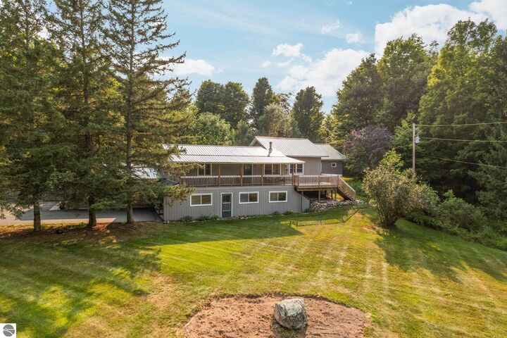 Property Photo: 8017 + 8135 Honey Hollow Road MI 49615