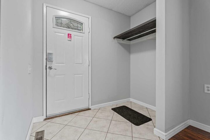 Property Photo: 7172 Coach Hill Road SW 16 AB T3H 1C8