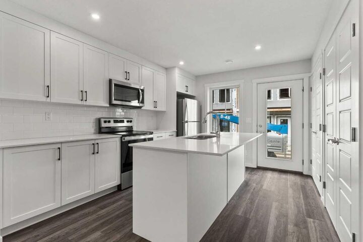 Property Photo: 40 Livingston Parade NE 203 AB T3P 2K4