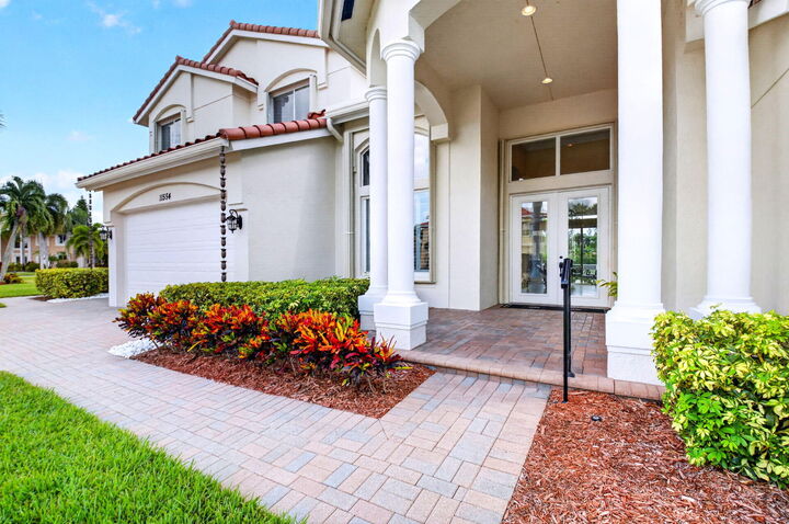 Property Photo: 11554 Knightsbridge Place FL 33449