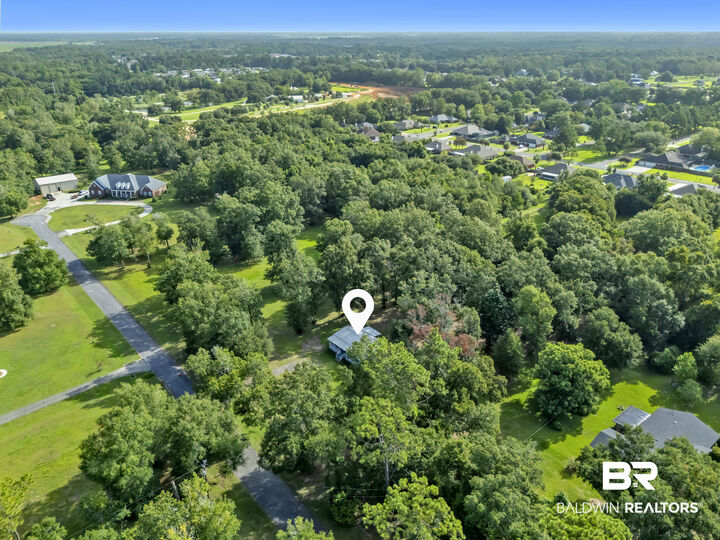 Property Photo:  12556 Woodland Dr.  AL 36535 