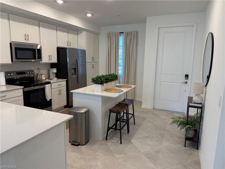 Property Photo:  18421 Copperhead Ct N 215  FL 33936 