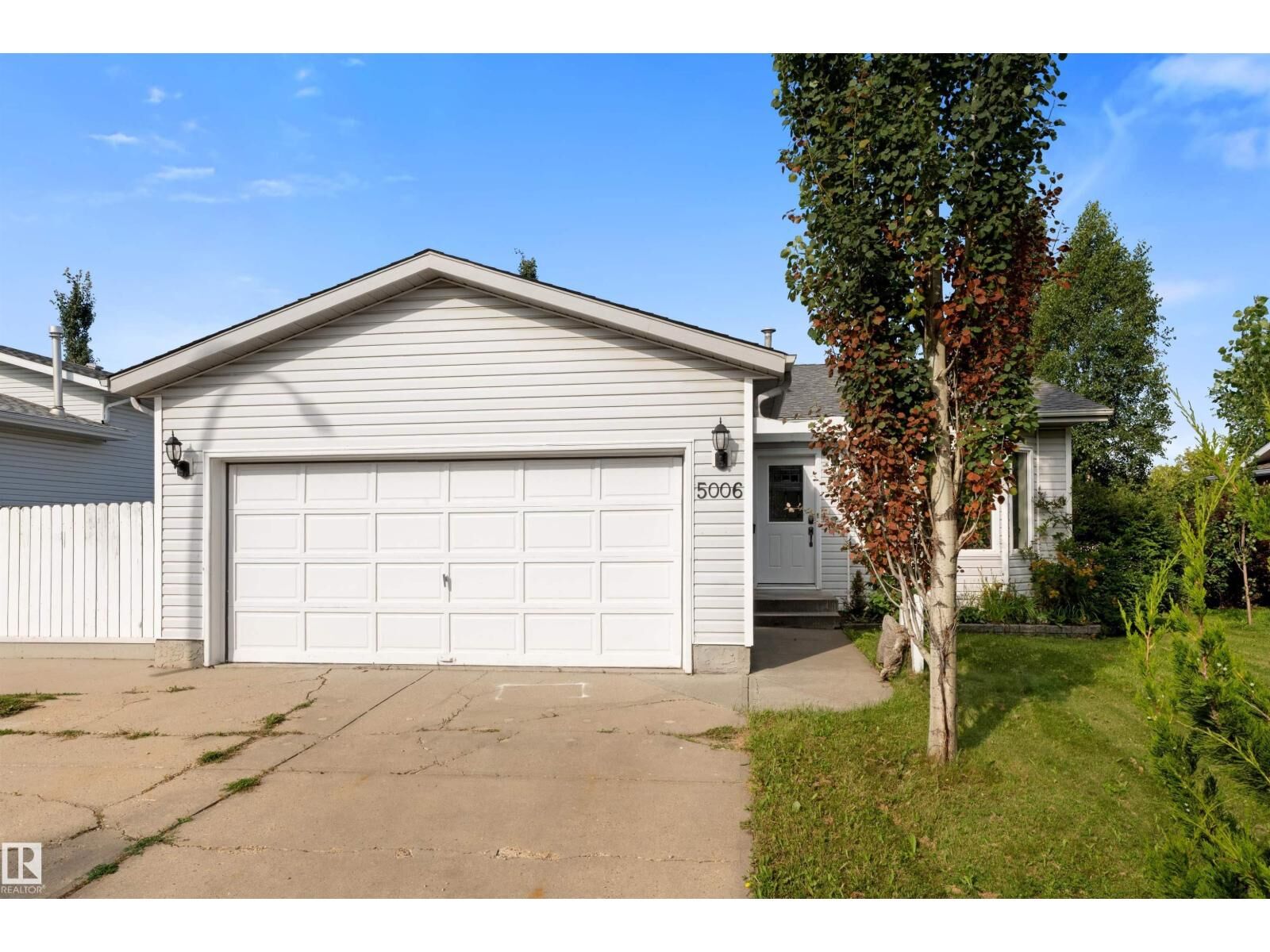 Property Photo:  5006 55 St  AB T4X 1E1 