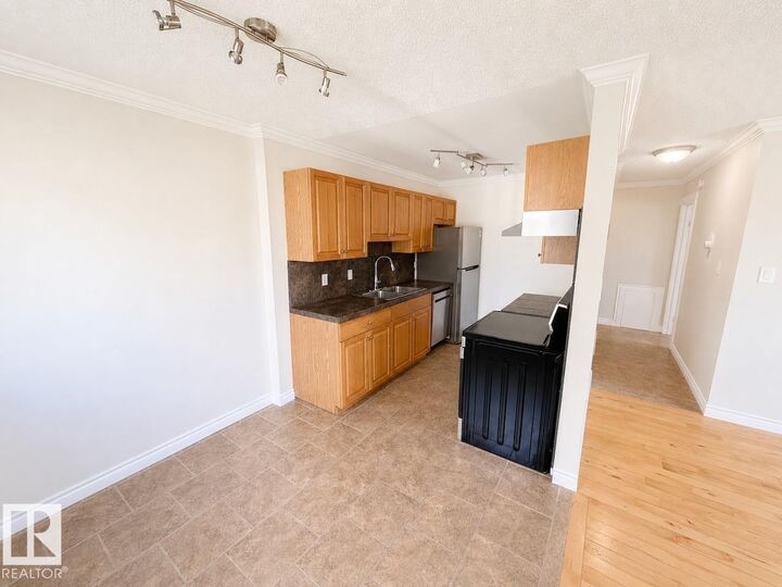 Property Photo:  10904 159 Street NW 6  AB T5P 3C1 