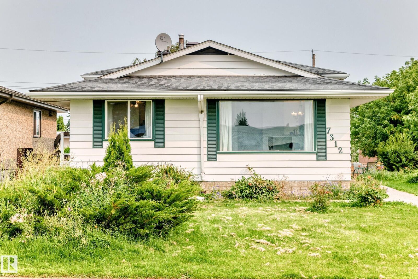 Property Photo: 7312 Delwood Road NW AB T5C 3A7