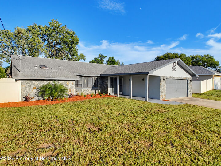 Property Photo:  5442 Parnell Avenue  FL 34608 