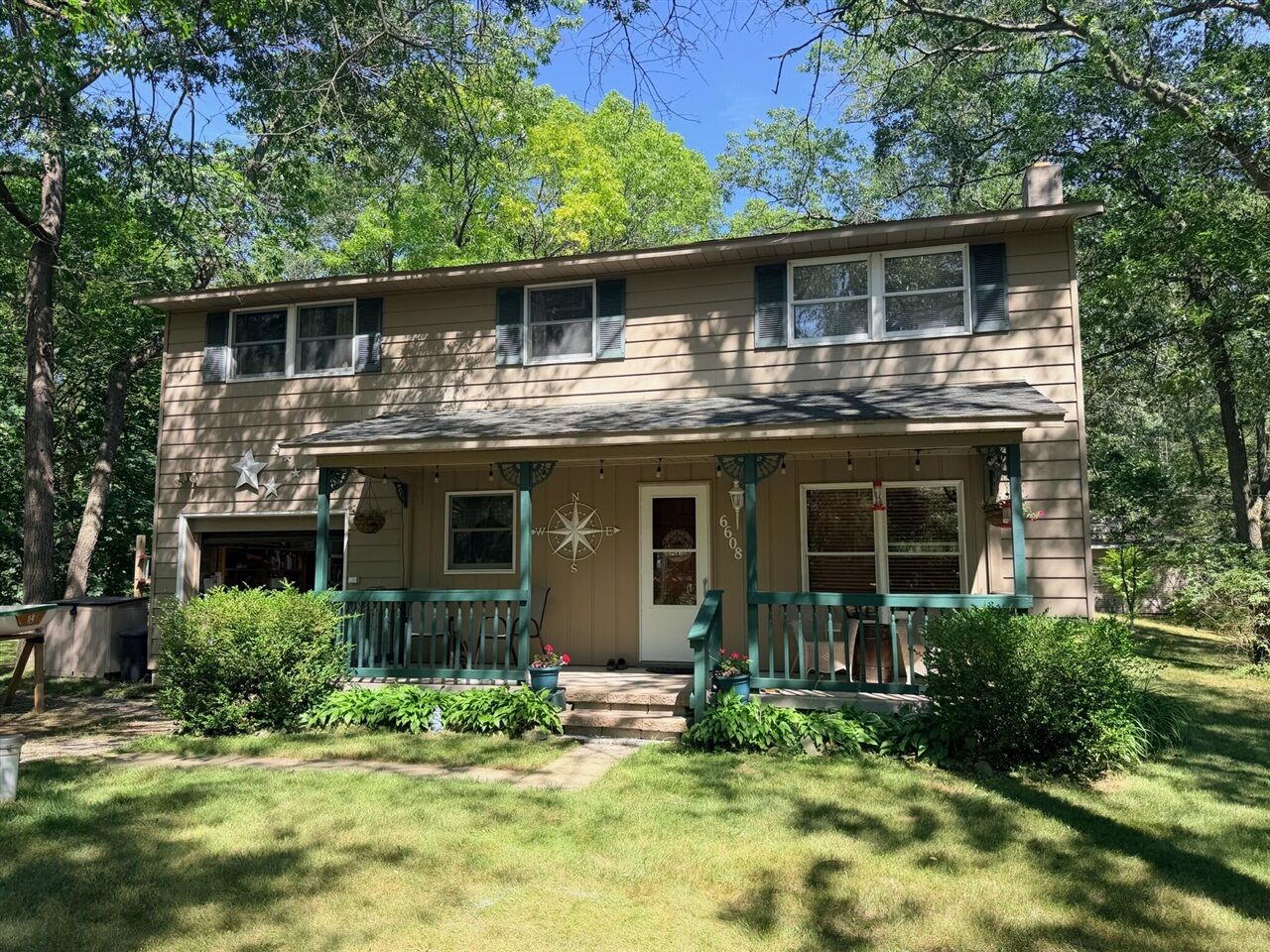 Property Photo:  6608 Sylva Beach Road  MI 48725-9623 