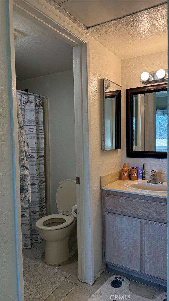 Property Photo: 6131 Calle Mariselda 104 CA 92124