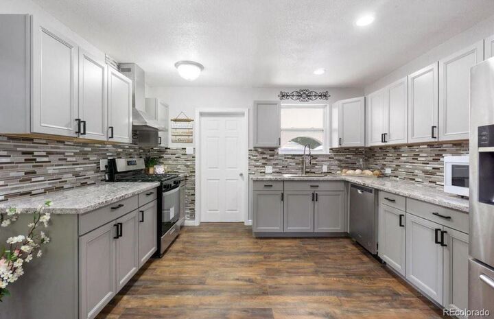 Property Photo:  521 N Osceola Street  CO 80204 