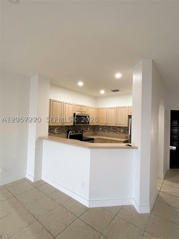 Property Photo:  12162 SW 5th Ct  FL 33025 