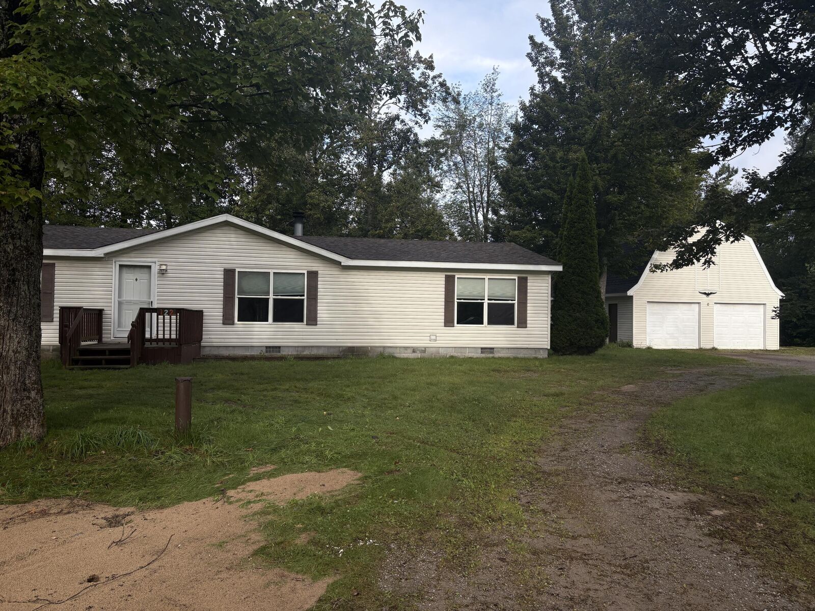 Property Photo:  122 Crockett Road  MI 49707 