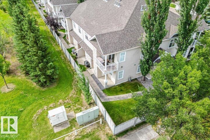 Property Photo: 1179 Summerside Drive SW 1 AB T6X 1K1