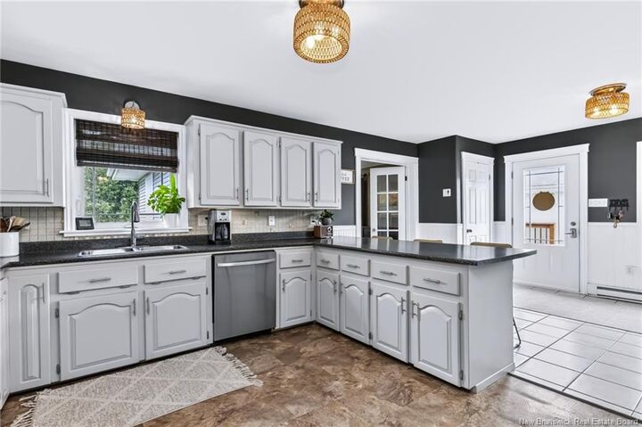 Property Photo:  65 Meadow Avenue  NB E5N 5E3 