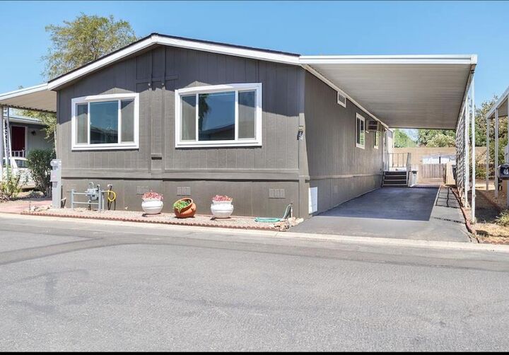 Property Photo:  860 E Grangeville Boulevard 44  CA 93230 
