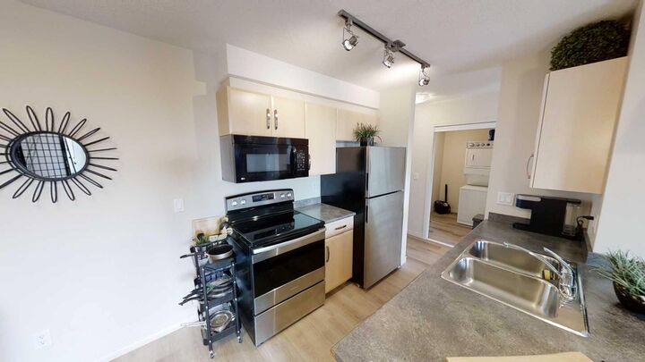 Property Photo:  9124 96 Avenue 411  AB T8X 0A1 