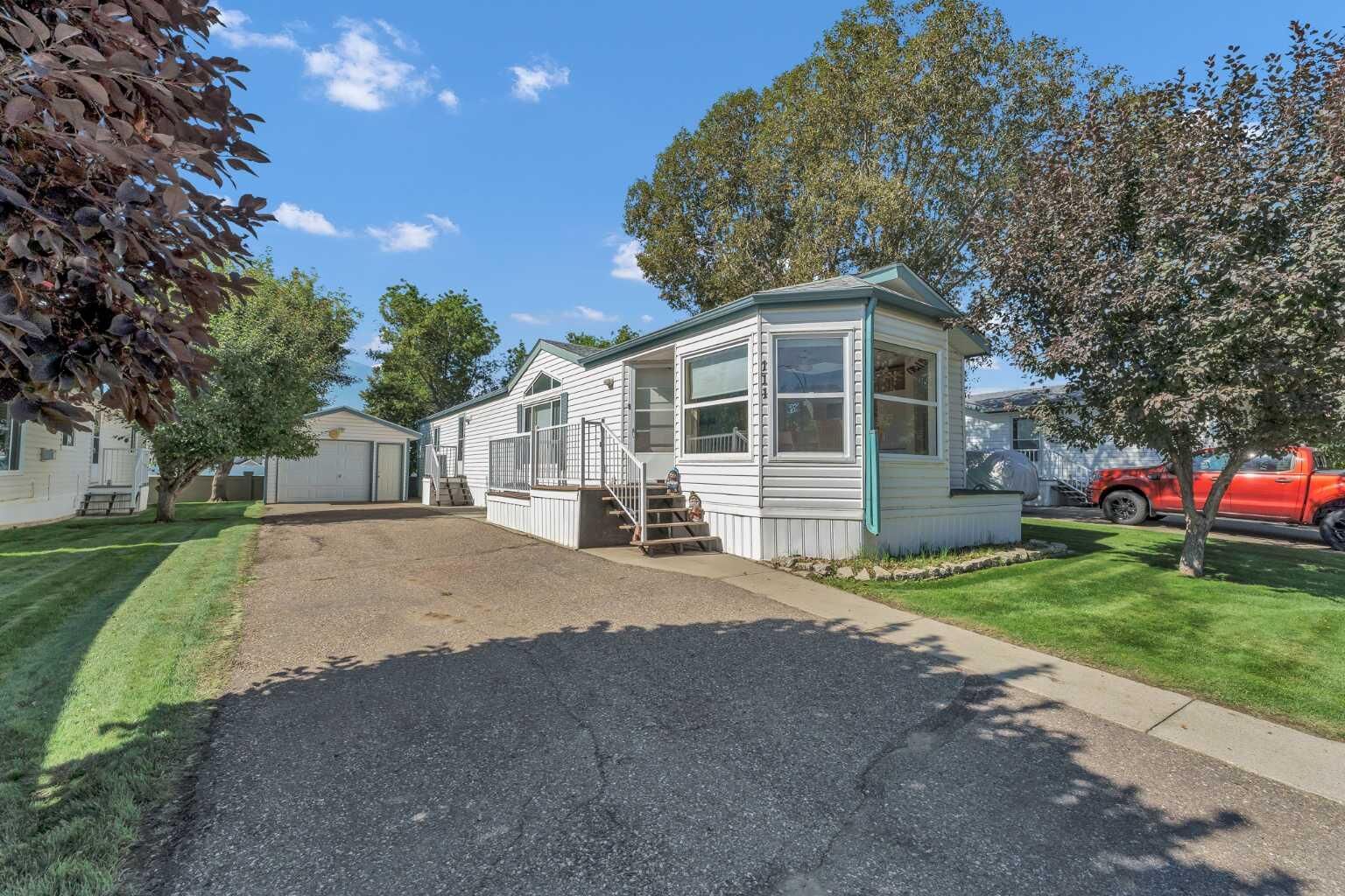 Property Photo:  1600 Strachan Road SE 111  AB T1B 4M3 